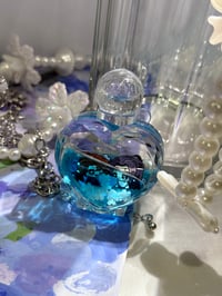 Image 1 of M.X.T.X Liquid Heart Bottles