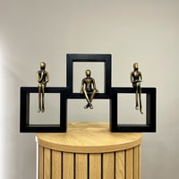 Family of 3 Sitting On 3 Frames 26x45cm