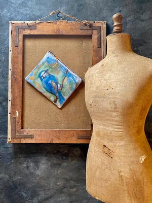 Image of blue bird pouch