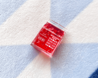 Image 2 of Gravel's Liquid Ruby Carton Keychain