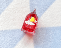 Image 3 of Gravel's Liquid Ruby Carton Keychain