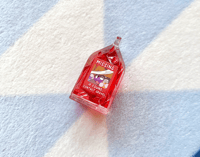 Image 4 of Gravel's Liquid Ruby Carton Keychain