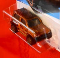Image 2 of 2024 Hot Wheels Super Treasure Hunt - Mitsubishi Pajero Evolution – Diecast Car NIP”