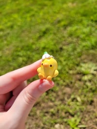 Image 3 of Bomi flower hat charm