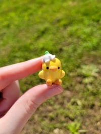 Image 2 of Bomi flower hat charm