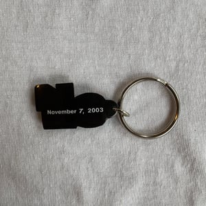 Image of Elf (2003) Promotional Keychain
