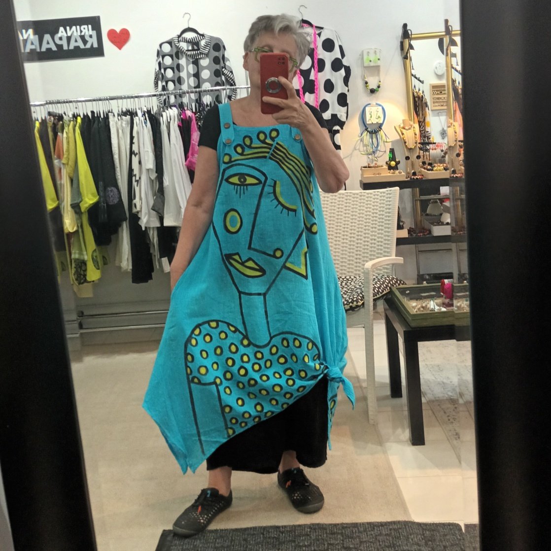 Image of turquoise hand painted jumper