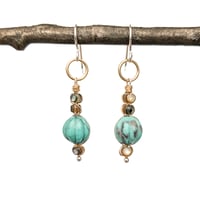 Image 1 of Carved turquoise and abalone mixed metal earrings