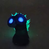 Image 3 of Norm - turple painted glow eyes spikes
