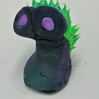 Image 1 of Norm - turple painted glow eyes spikes
