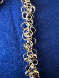 Image 2 of Gold necklace with tiny clusters of gold rings