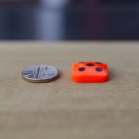 Image 2 of Bright orange dice Cabochon