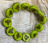 Bee Beads Lime Green with Dark Bronze Wash Coin Carved Czech Glass Table Cut Beads 12mm 12 beads