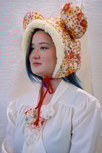 Image 1 of La Modiste: Quilted Orange Spring Bear Hat