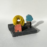 Red barn and hay bale