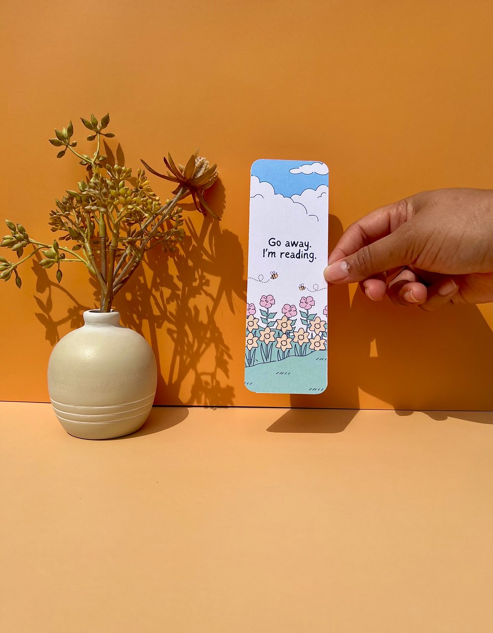 Image of Go away, I'm reading Bookmark