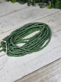 Image 1 of Green Aura 