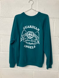 Image 1 of Guardian Angels, teal L (23"P2P, 26"S2H, 30"C2C) Second 