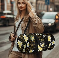 Image 1 of Yellow Plumeria on Black Travel Bag