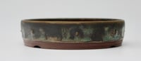 Image 1 of Round studded  bonsai pot in a copper glaze. D.150mm