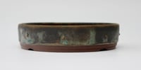 Image 5 of Round studded  bonsai pot in a copper glaze. D.150mm