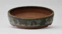 Image 3 of Round studded  bonsai pot in a copper glaze. D.150mm