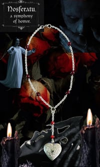 Image 1 of REVAMPED nosferatu red beaded necklace 