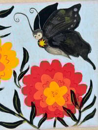 Image 3 of “Marigold Visitor”