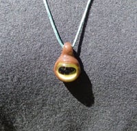 Image 1 of Goats eye glass pendant. Handblown glass pendant/keychain/zipper pull/chain pull Handcrafter by m...