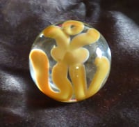 Image 1 of Handmade glass Om symbol marble Made of borosilicate boro glass. Made in the USA