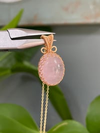 Image 1 of Gold Rose Quartz Oval Crystal Necklace
