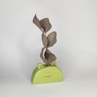 Pieni sammakko savimaljakko