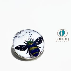 Bees on a brooch