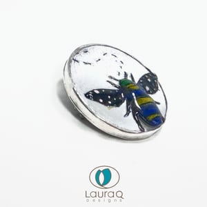 Bees on a brooch