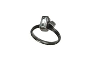 Image 1 of Oxidised silver ring set with a baguette-cut aquamarine in an architectural design 