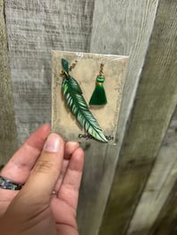 Image 1 of Pluma de la suerte del Fénix.