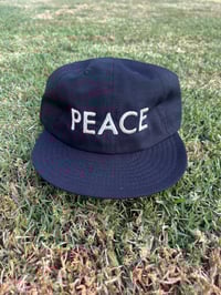Image 1 of Peace Word Hat Black