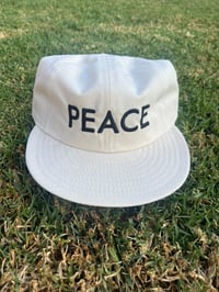 Image 1 of Peace Word Hat White