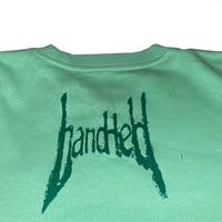 Image 3 of green/purple logo sweatshirt