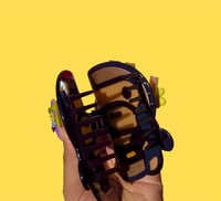 Image 2 of banana milo hairclip
