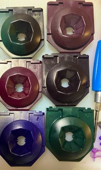 Image 1 of N64 dyed OEM joystick module gates 