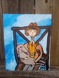 Image 1 of Man Holding Donkey
