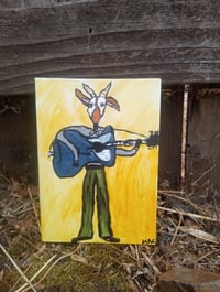 Image 1 of Goat Playing Guitar