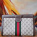Image of  Vtg Gucci Brown Monogram Velcro Closure Clutch 