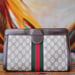 Image of  Vtg Gucci Brown Monogram Velcro Closure Clutch 