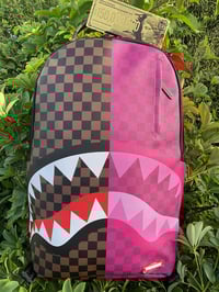 Sprayground backpack 1/2