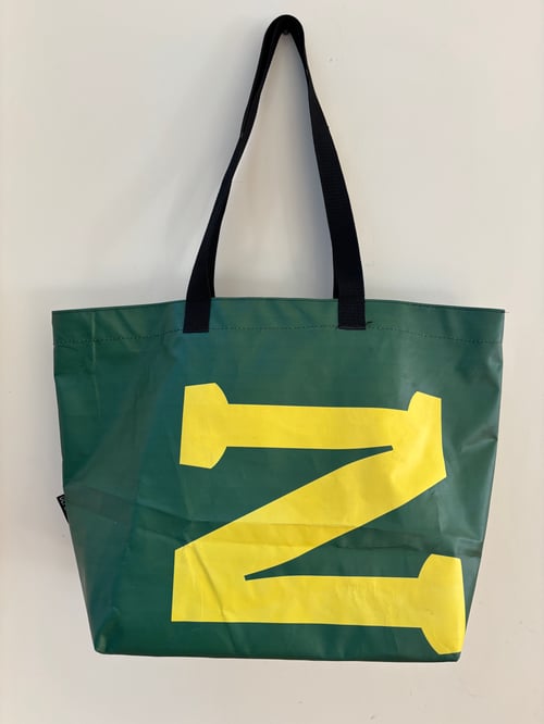 Image of Shopper - yellow letters