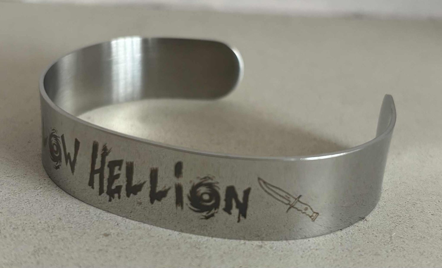Image of Officially licensed hollow Hellion with knife bracelet 