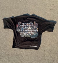 Image 6 of Black “Who is Tren5etter” oversized tee