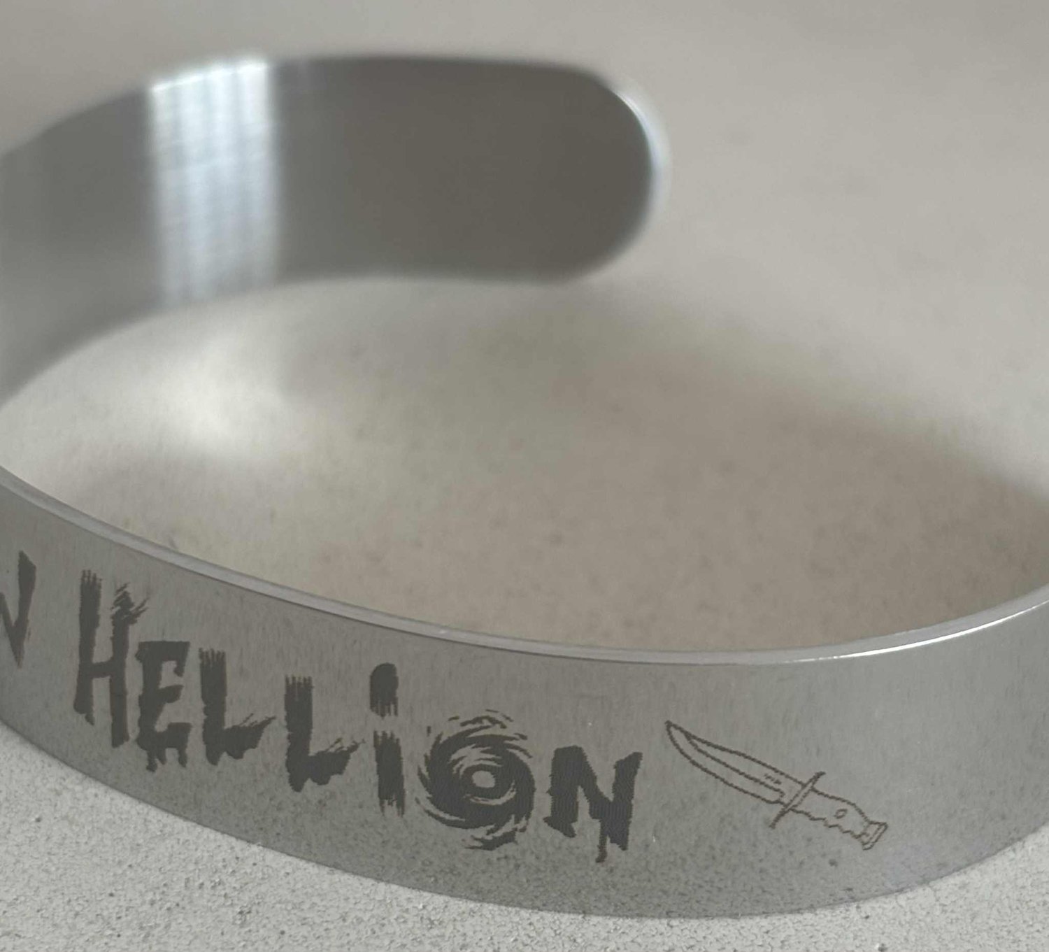 Image of Officially licensed hollow Hellion with knife bracelet 